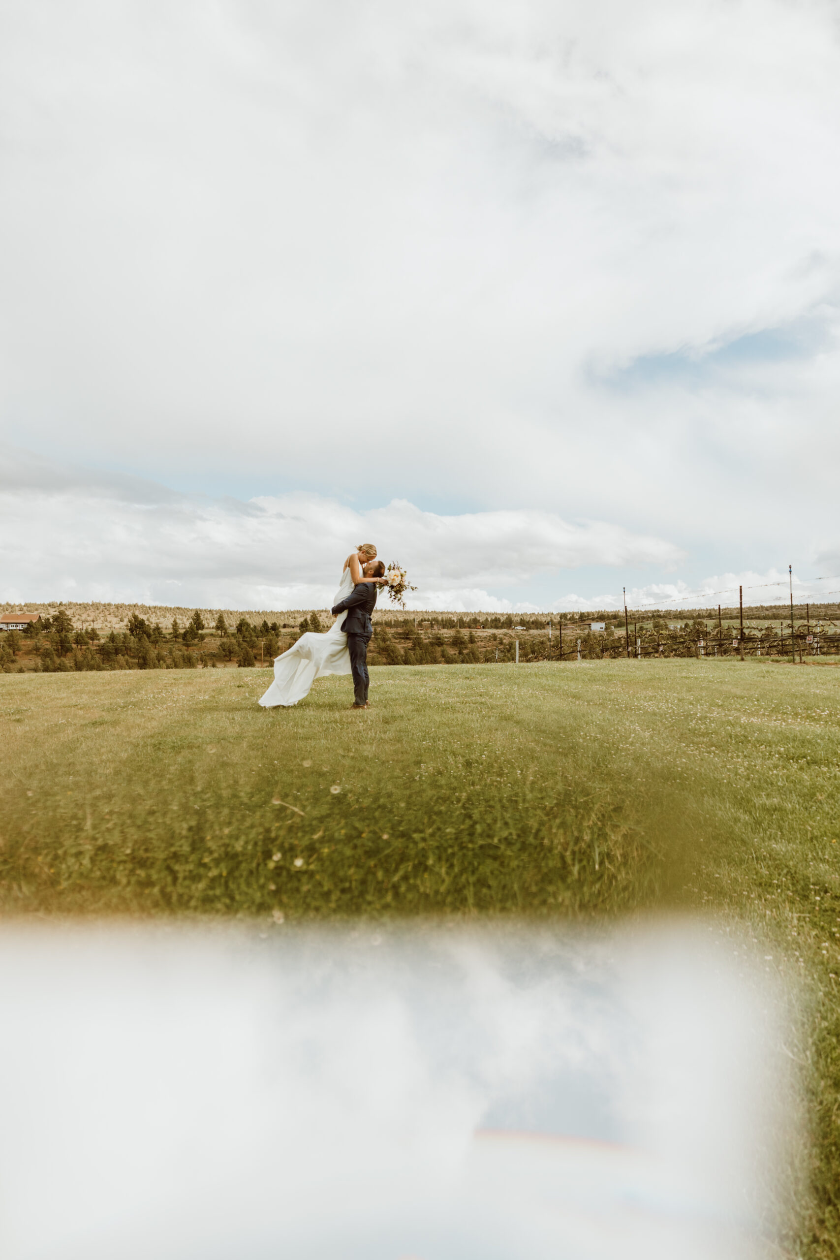 bride and groom on their elopement day in bend Oregon at faith hope and charity vineyards