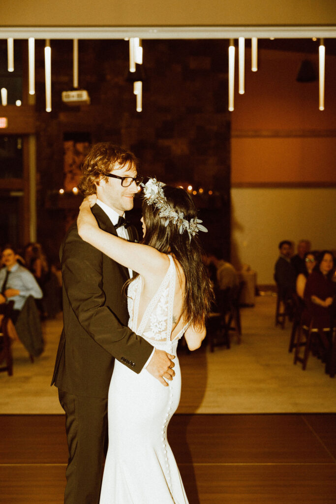 bride and groom dancing  at a destination wedding at Tetherow 