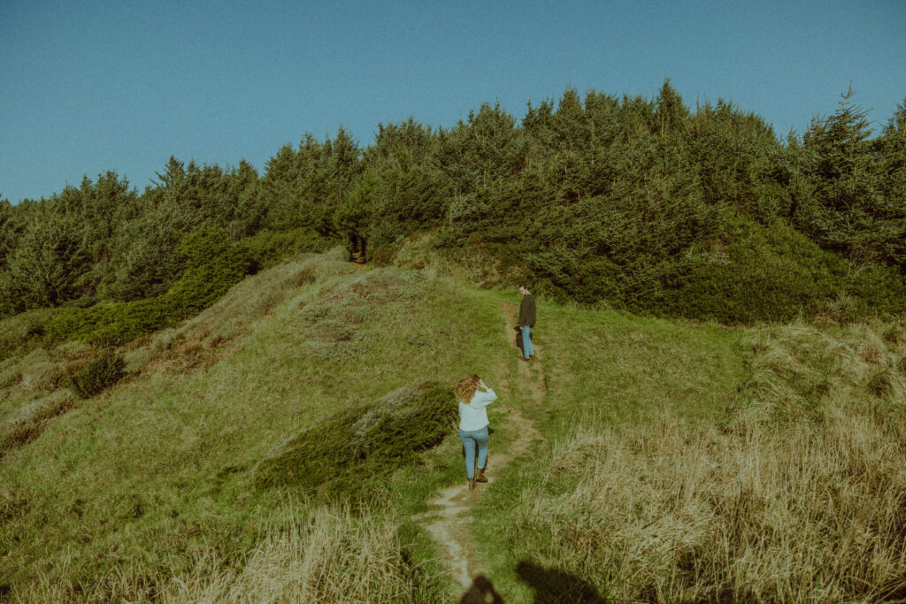 couple posing for their destination engagement photos at Samuel H Boardman state park on the oregon coast with bend oregon wedding photographer esther rohr 