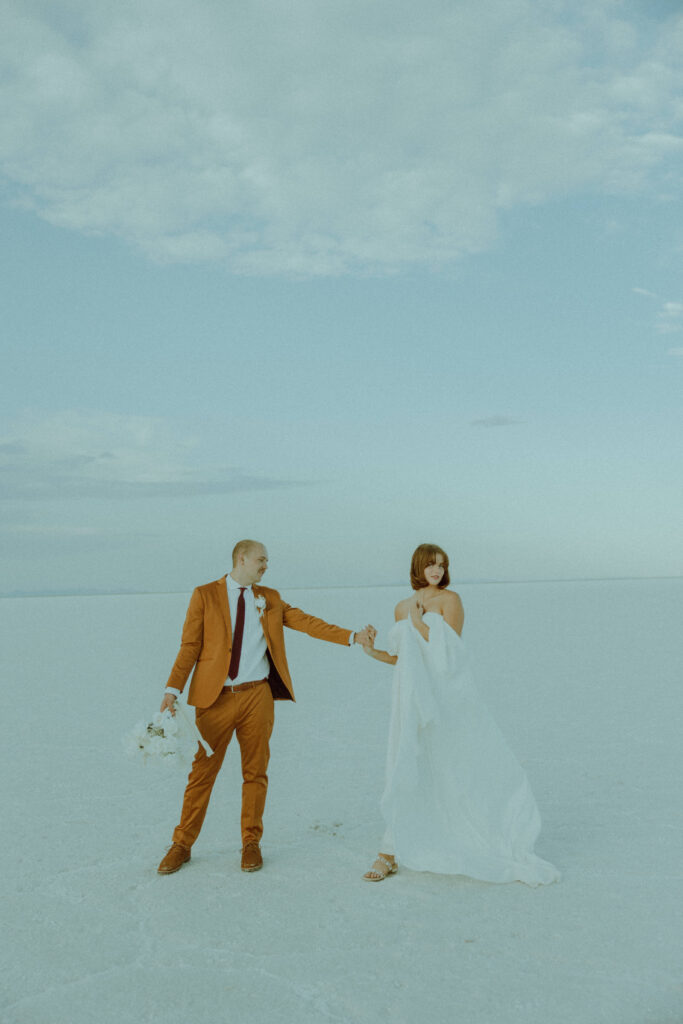  bride and groom at destination elopement at the salt flats in utah 