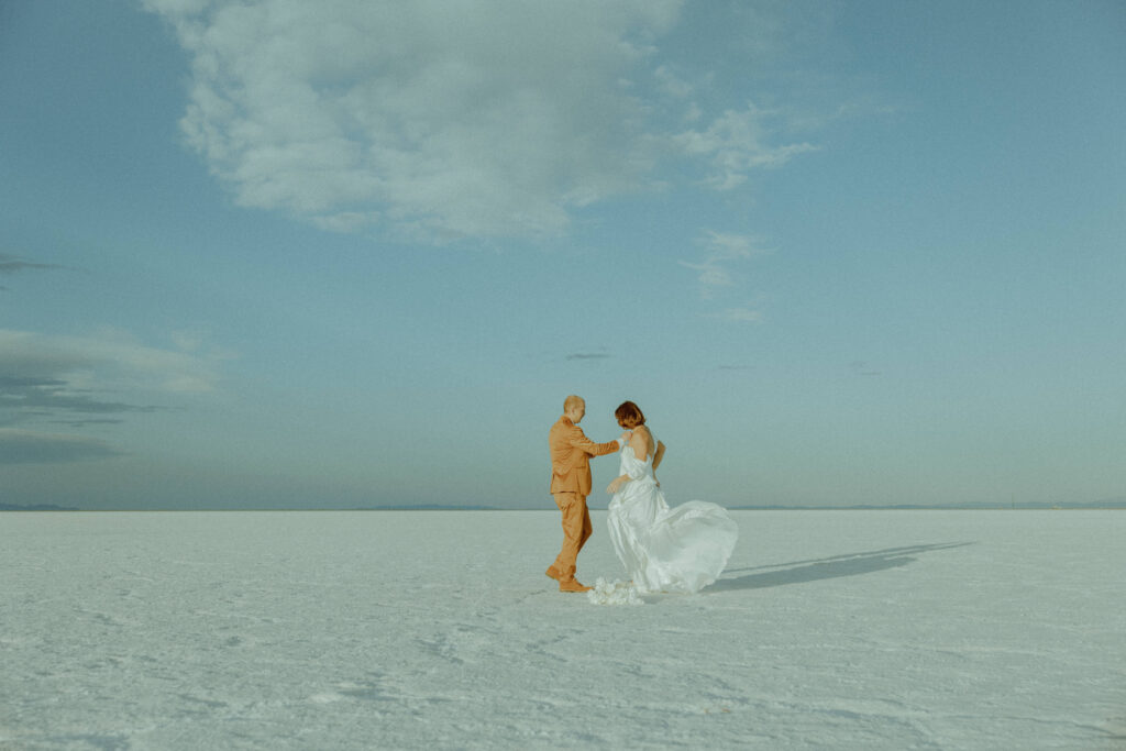 groom and bride at destination elopement at the salt flats in utah 
