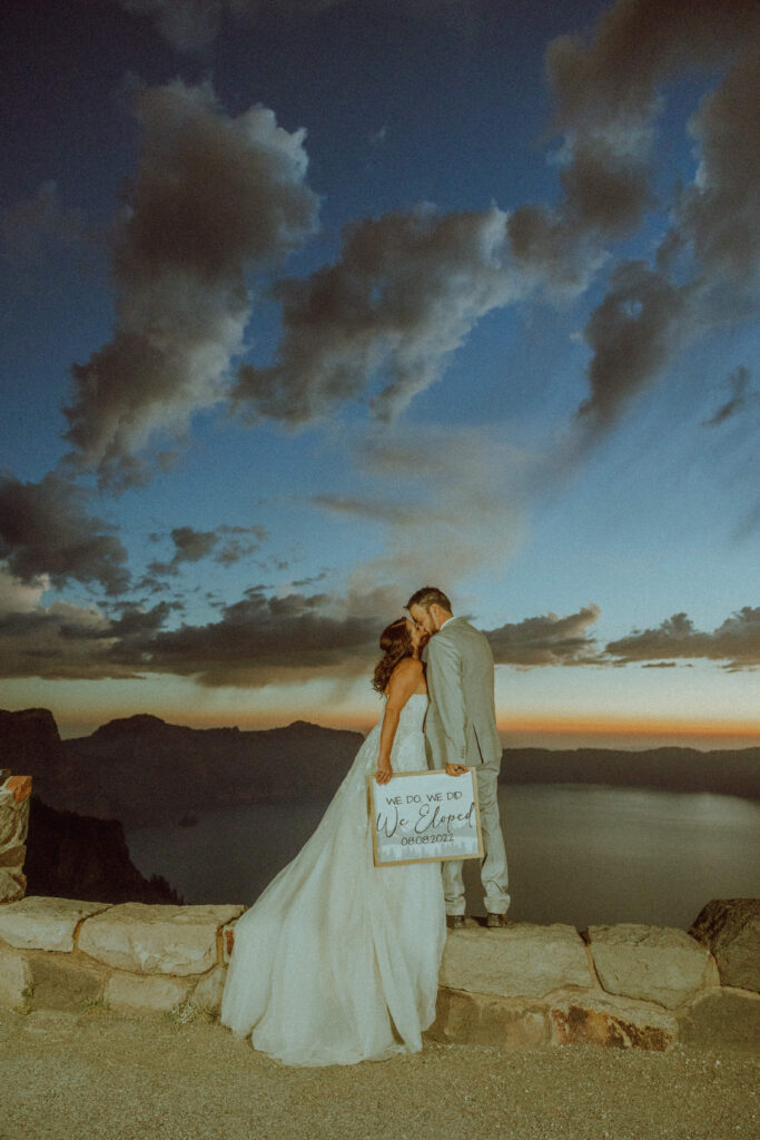bride and groom elopement kiss at crater lake national park in oregon 