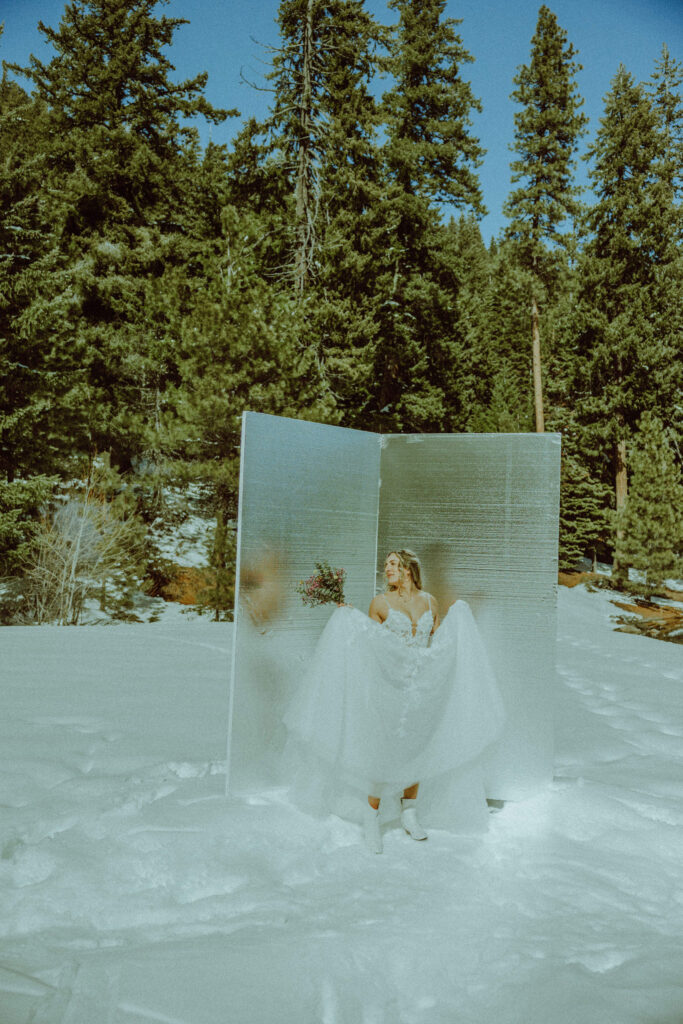 bride in wedding dress at winter elopement in bend oregon 