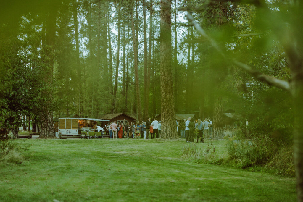 welcome dinner on lawn at lake creek lodge in oregon