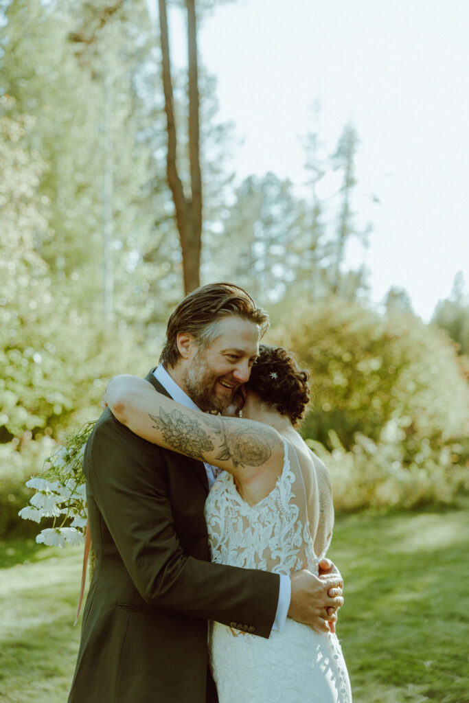 bride and groom wedding portrait at lake creek lodge