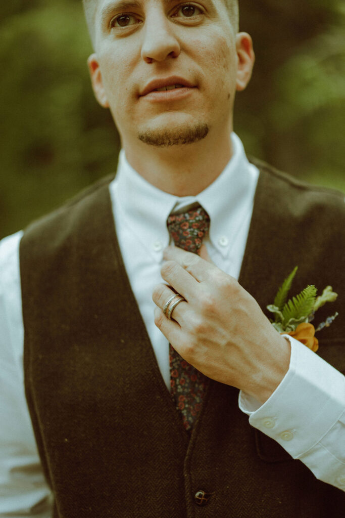 bend oregon groom adjusting his tie