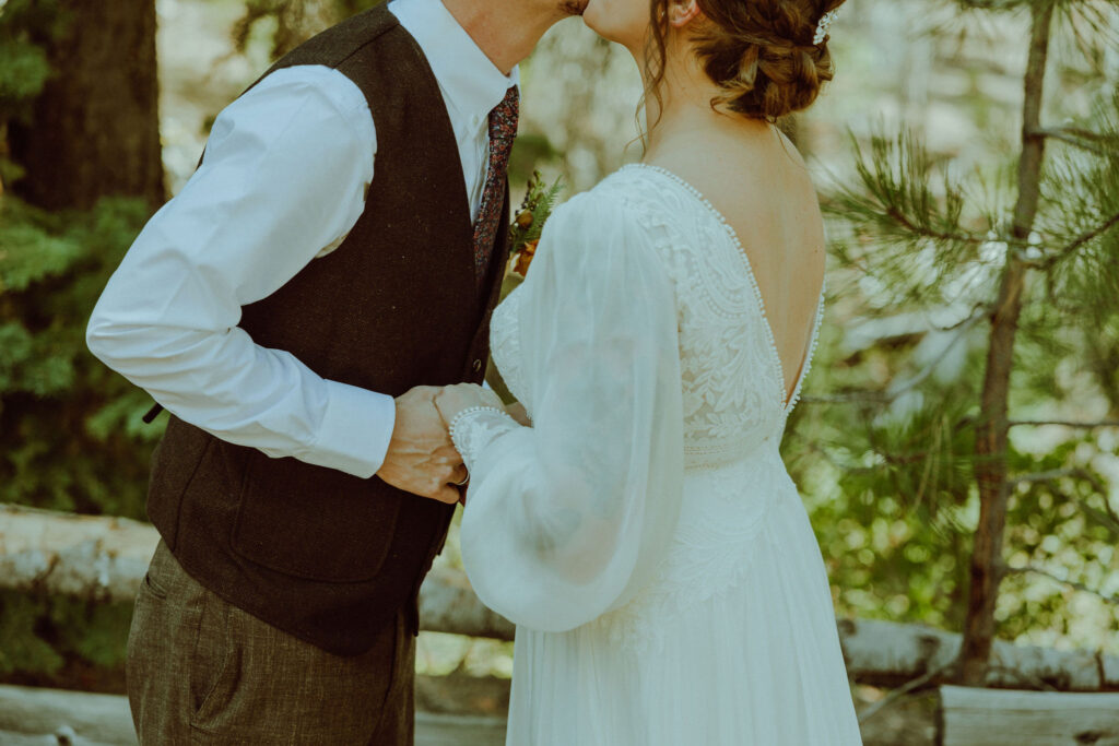 bride and groom first look at skyliner lodge wedding in the forest bend oregon