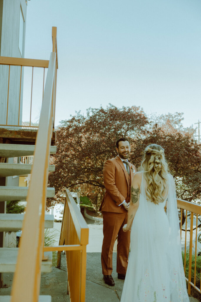 bride and groom first look on eclectic wedding day at campfire hotel 