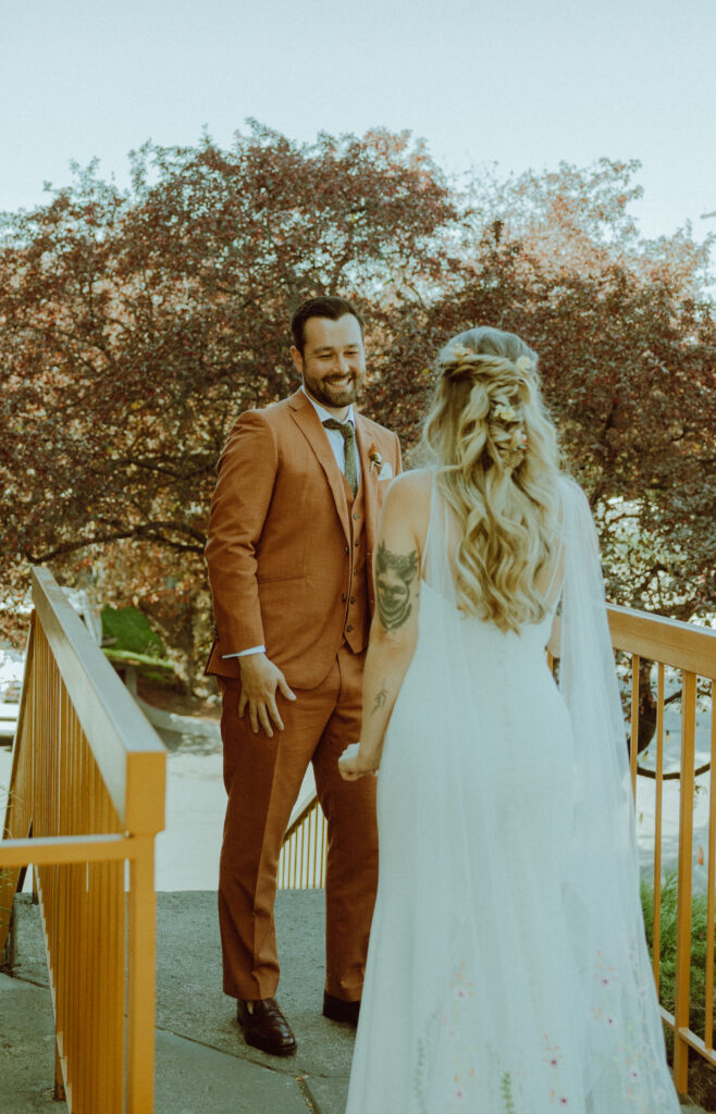 bride and groom first look on eclectic wedding day at campfire hotel 