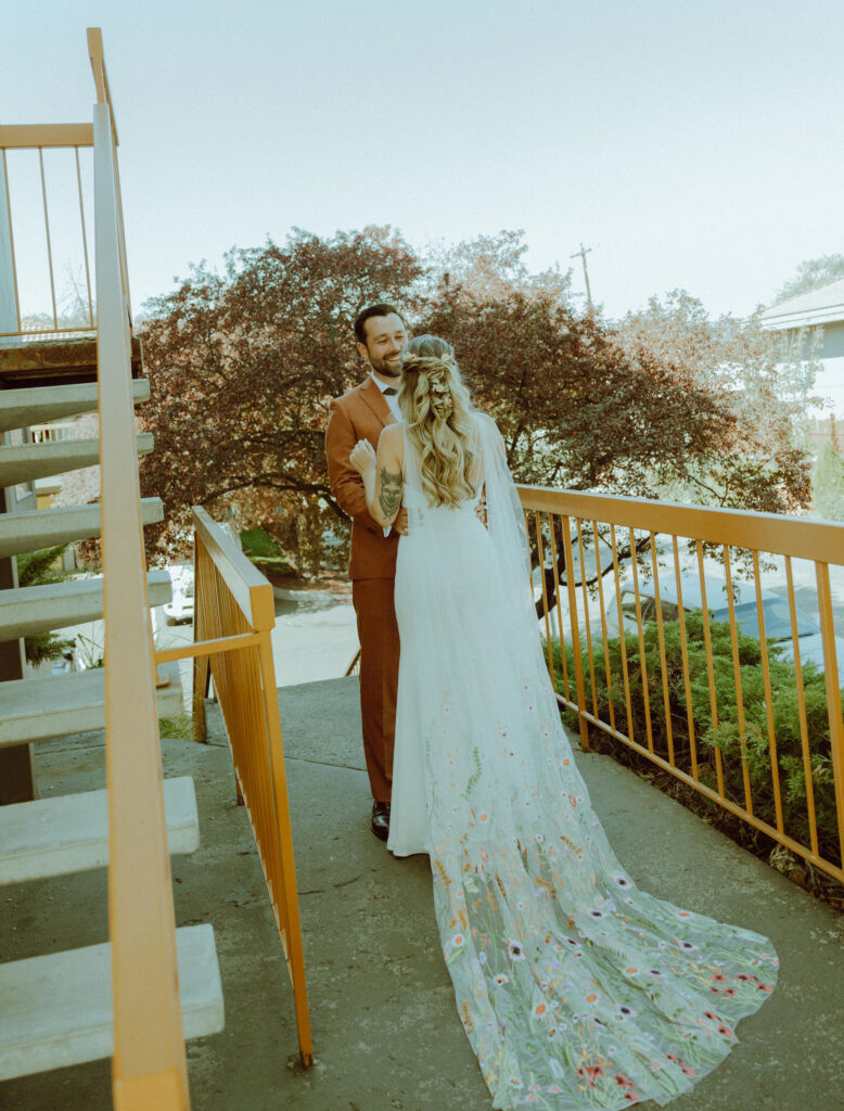 bride and groom first look on eclectic wedding day at campfire hotel 