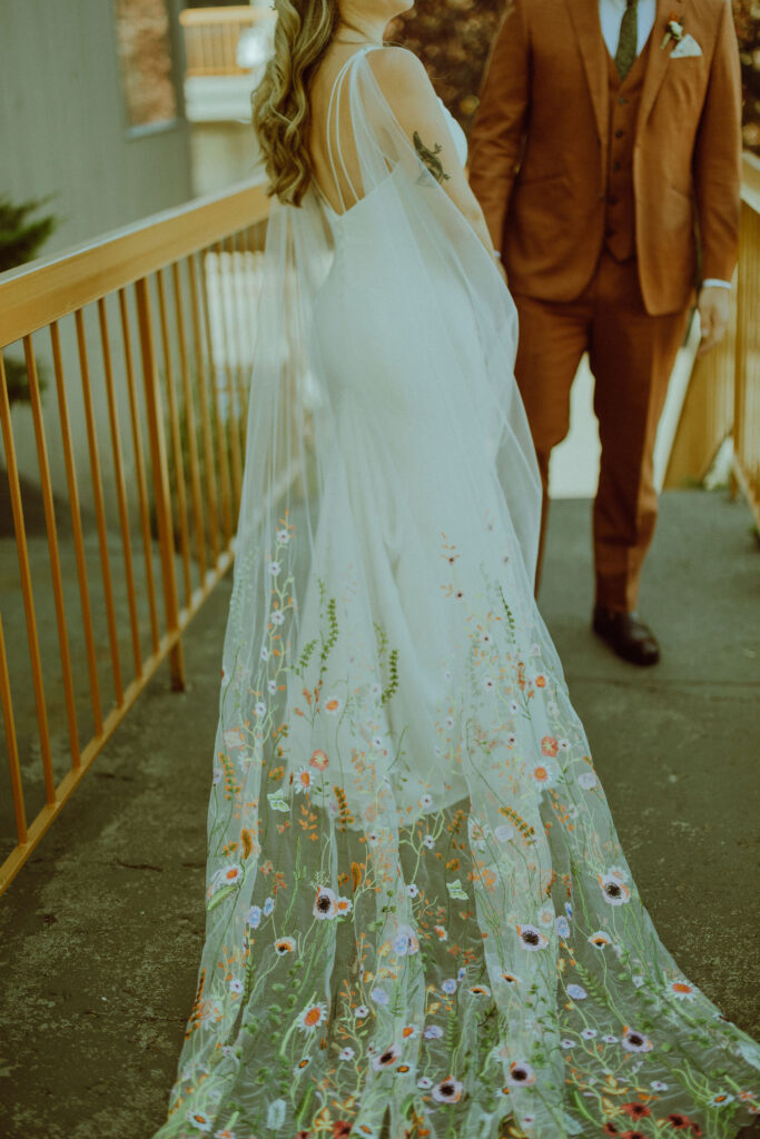 brides eclectic wedding veil full of embroidered flowers