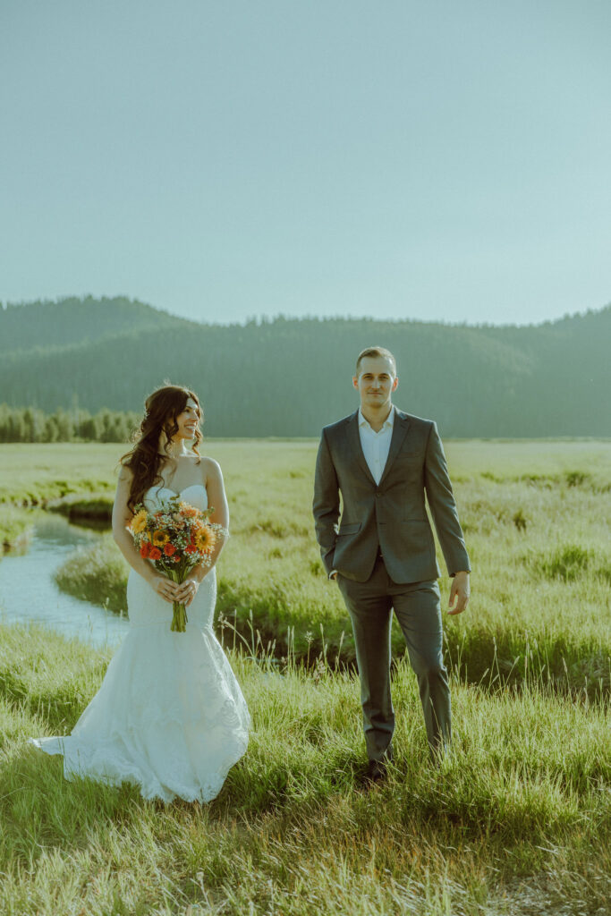 bride and groom pose for photo at sparks lake oregon elopement location in bend 