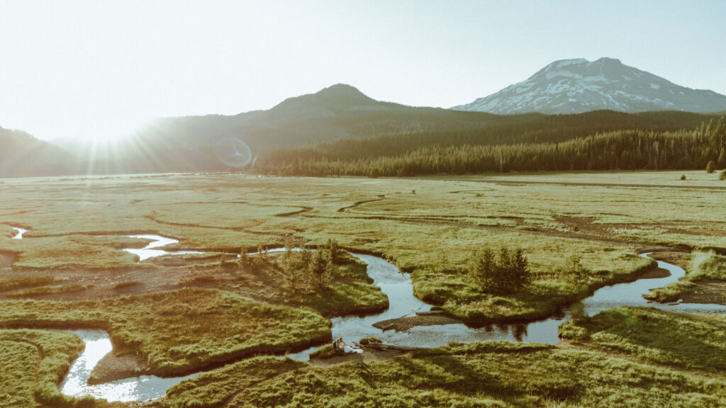 drone photo of bride and groom eloping at sparks lake meadow in bend oregon 