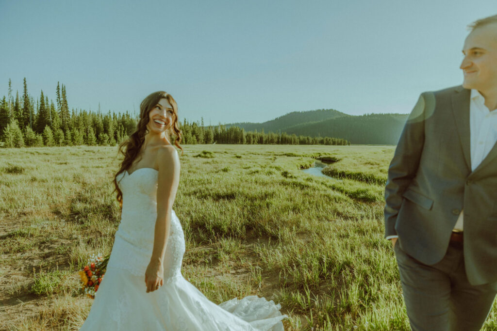 bride and groom pose for photo at sparks lake oregon elopement location in bend 