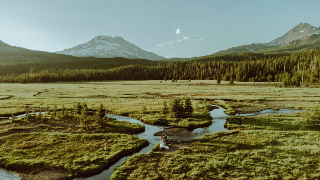 drone photo of bride and groom eloping at sparks lake oregon 