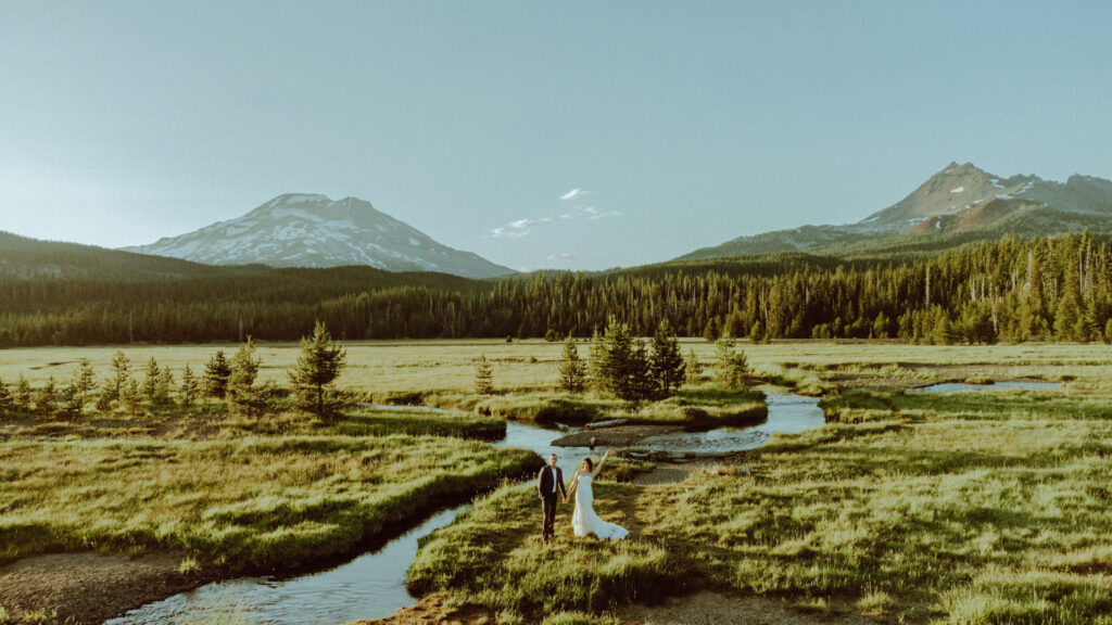 drone photo of bride and groom eloping at sparks lake oregon 