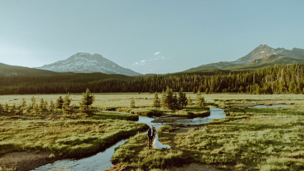 drone photo of bride and groom eloping at sparks lake oregon 