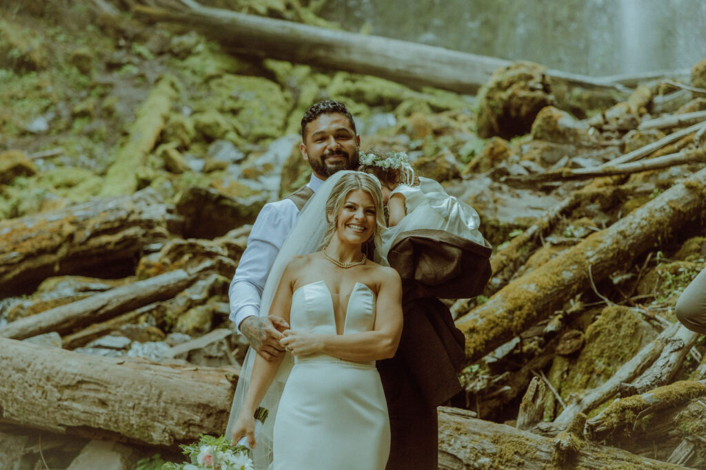 bend bride and groom at their proxy falls elopement in oregon 