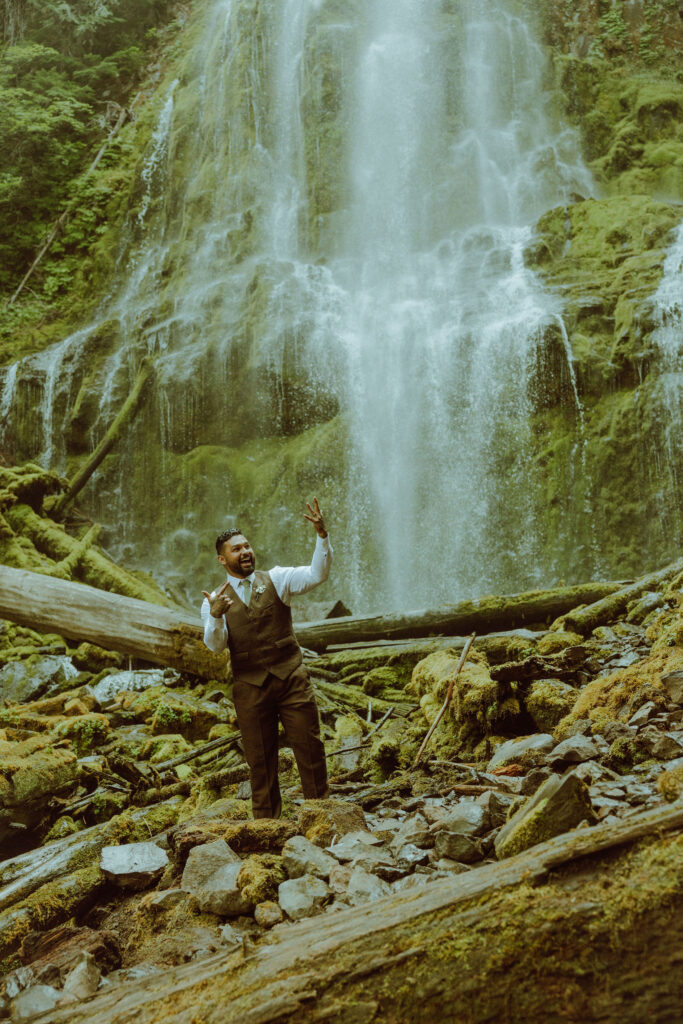 bend bride and groom at their proxy falls elopement in oregon 