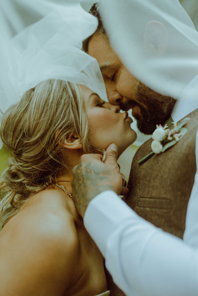 bend bride and groom at their proxy falls elopement in oregon 