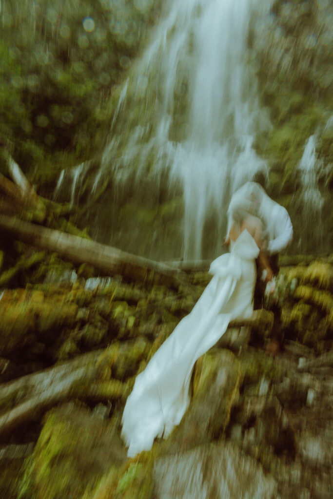 bend bride and groom at their proxy falls elopement in oregon 