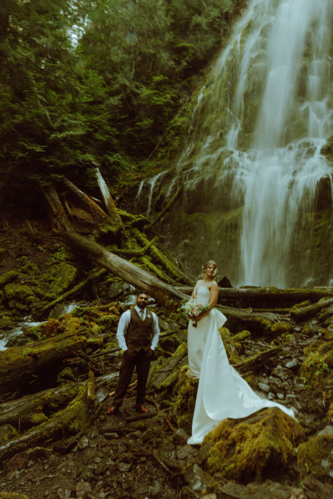 bend bride and groom at their proxy falls elopement in oregon 