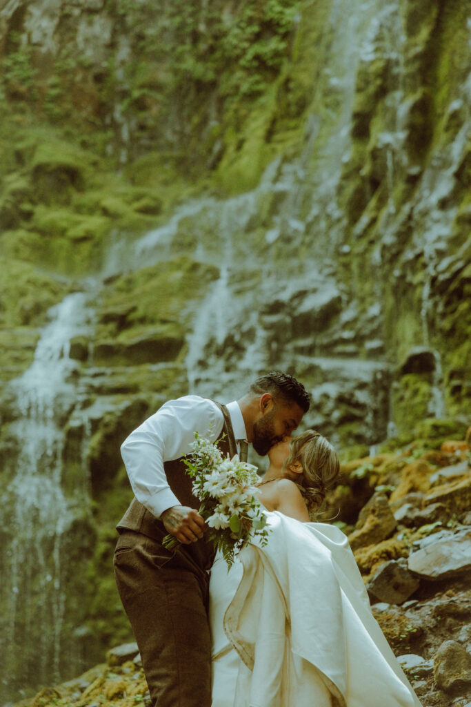 bend bride and groom at their proxy falls elopement in oregon 