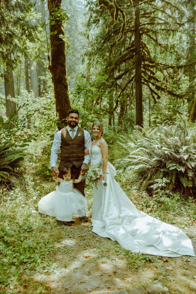 oregon bride posing in oregon forest 