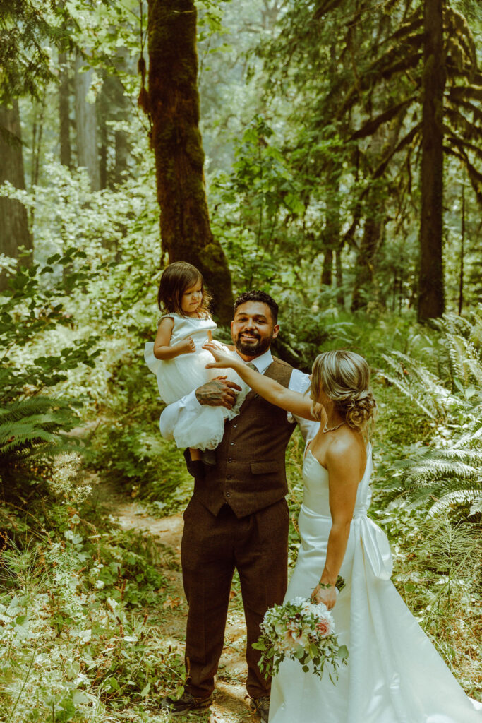 oregon bride posing in oregon forest 