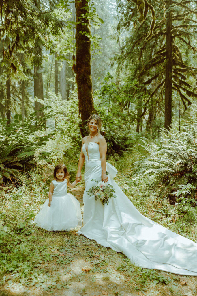 oregon bride posing in oregon forest 