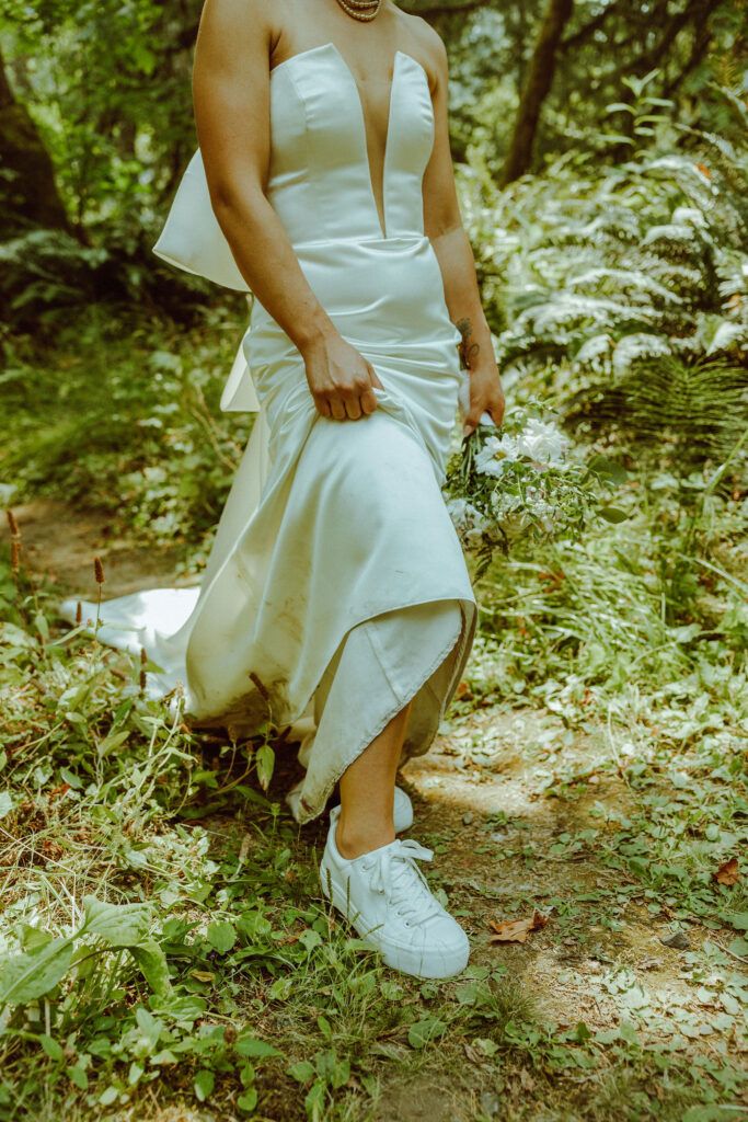 oregon bride posing in oregon forest 