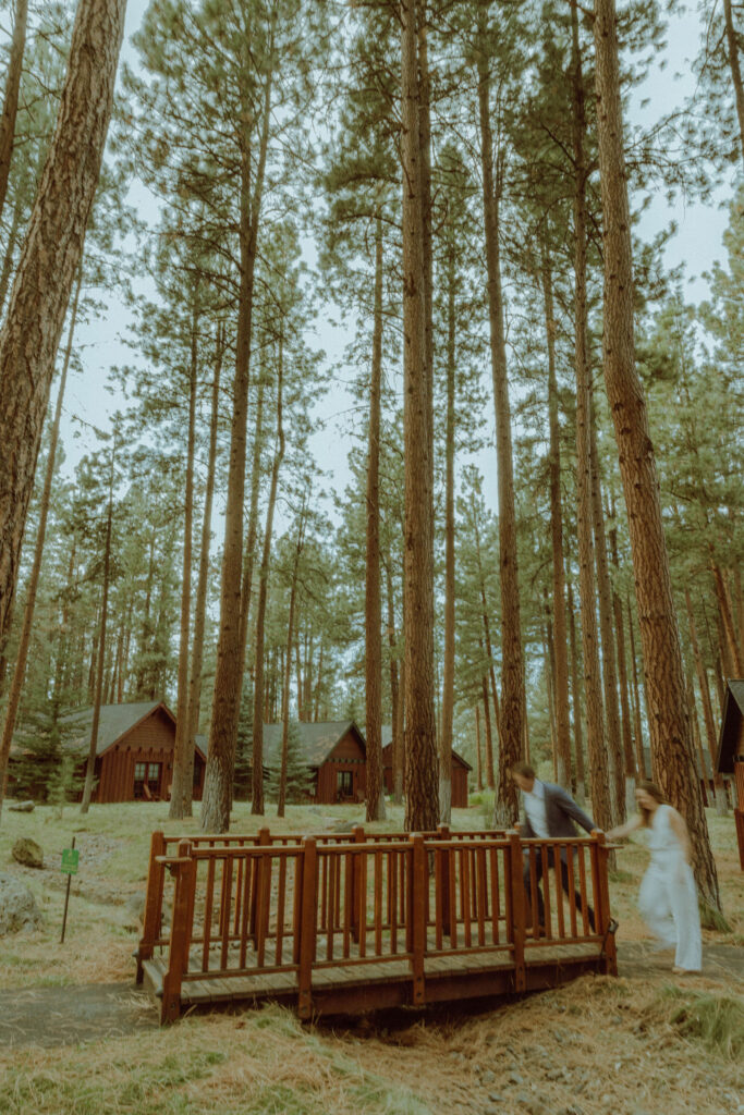 bride and groom posing outdoors at elopement day in fivepine lodge sisters oregon