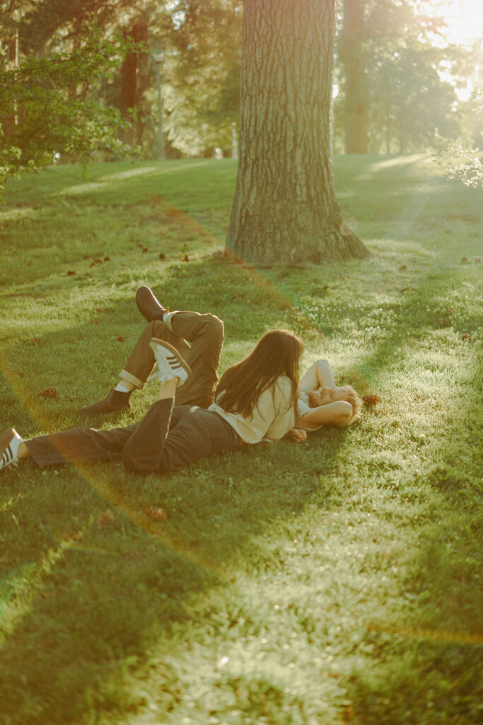engaged couple poses playfully for cinematic photoshoot