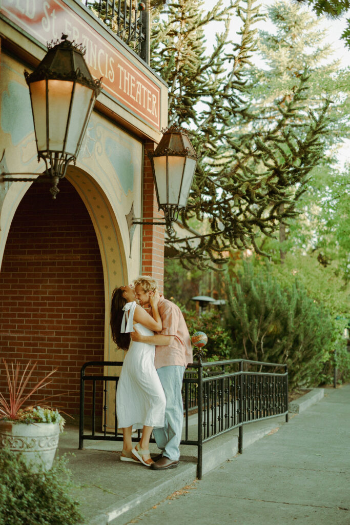 couple kissing for their engagement photos in bend oregon