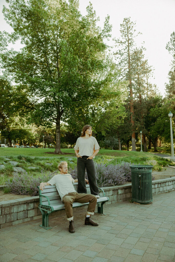 engaged couple poses stoicly for camera